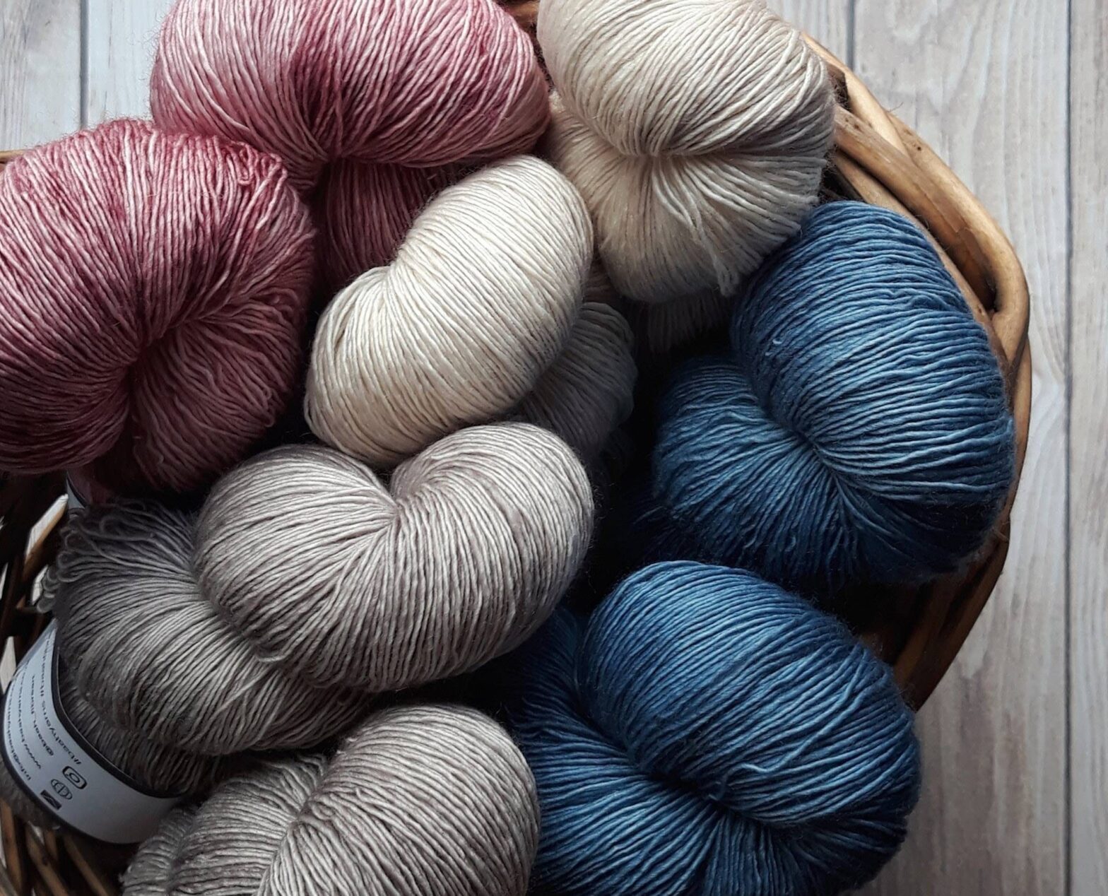 image of different coloured bunches of wool thread